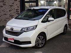 フリードハイブリッド　ハイブリッド・Ｇホンダセンシング　後期型　純正メモリーナビＴＶ　Ｂｌｕｅｔｏｏｔｈ　ＥＴＣ　両側自動ドア　Ｓ・Ｃパッケージ　スマートキー　シートヒーター　クルコン　ホンダセンシング　ＬＥＤライト　純正アルミ　６人乗り（ホンダ）