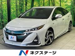 プリウスＰＨＶ　Ａプレミアム　禁煙車　モデリスタ　１１．６型ナビ　衝突軽減　レーダークルーズ　ＢＳＭ　ＨＵＤ　パーキングアシスト　合皮レザー　パワーシート　シートヒーター　ステアリングヒーター　クリアランスソナー　モデリスタアルミ（トヨタ）